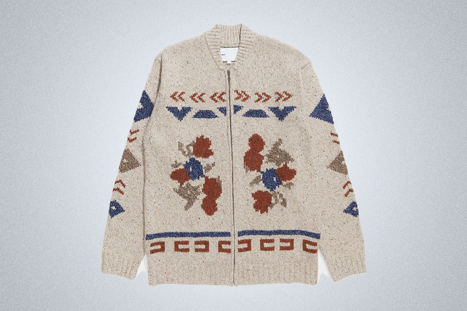 a cream knit cardigan