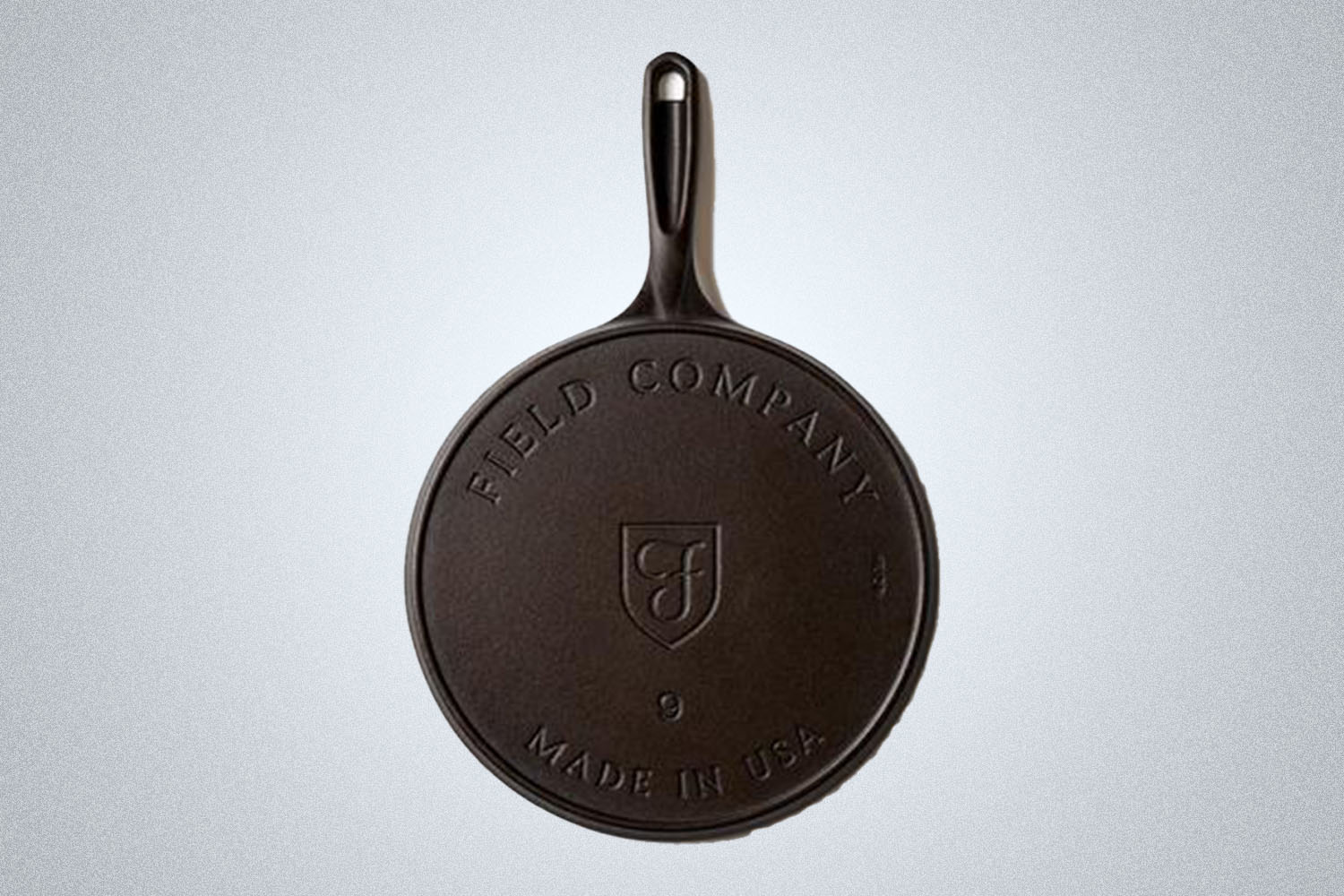 a cast iron griddle with branding
