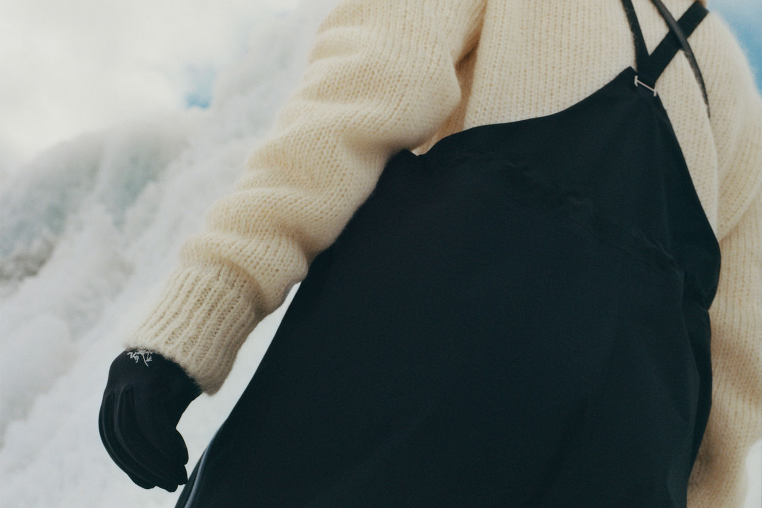 a close up of a sweater and covers
