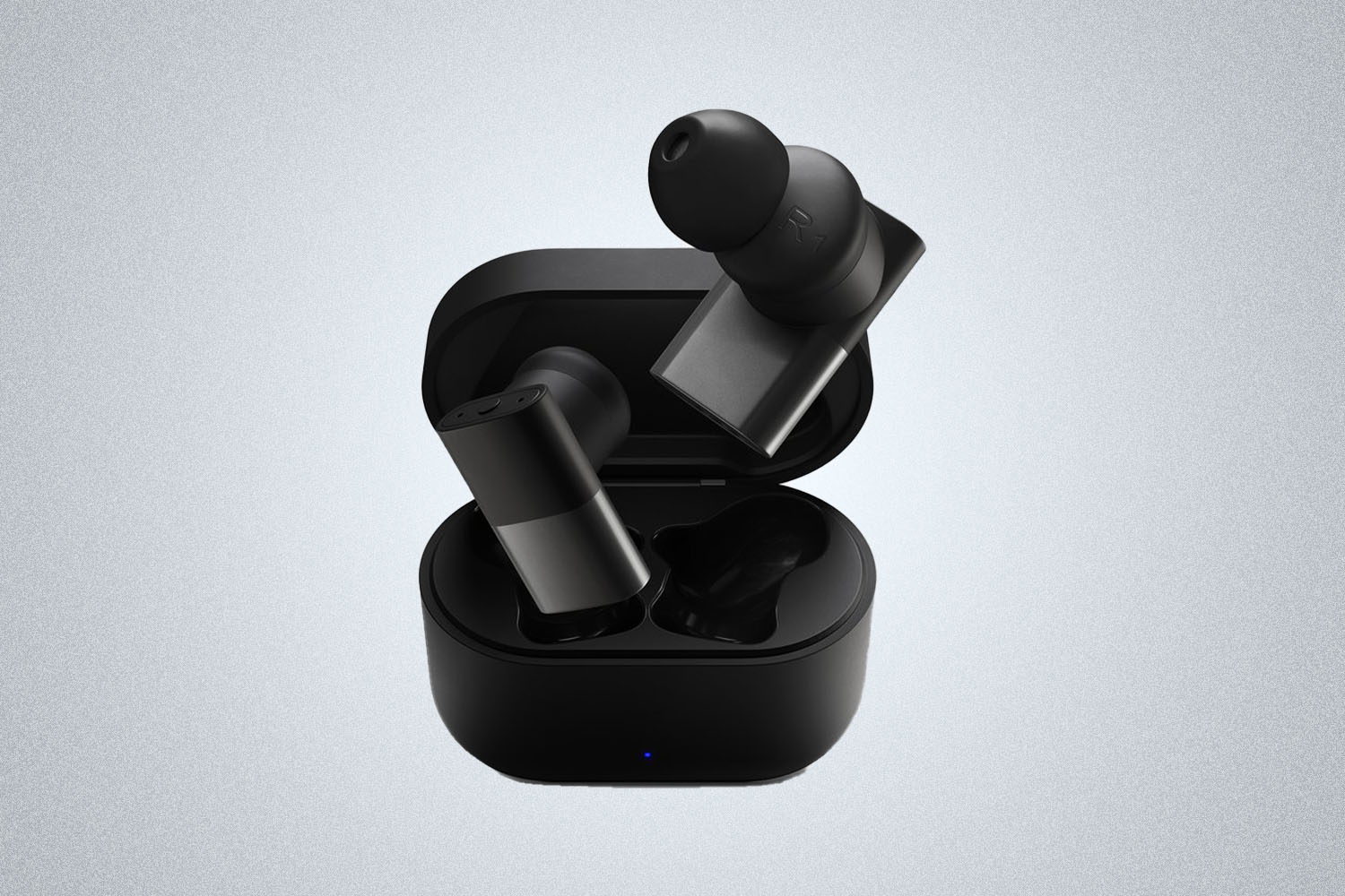 a pair of headphones and charging case