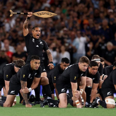 The All Blacks rugby side performing the traditional haka dance.