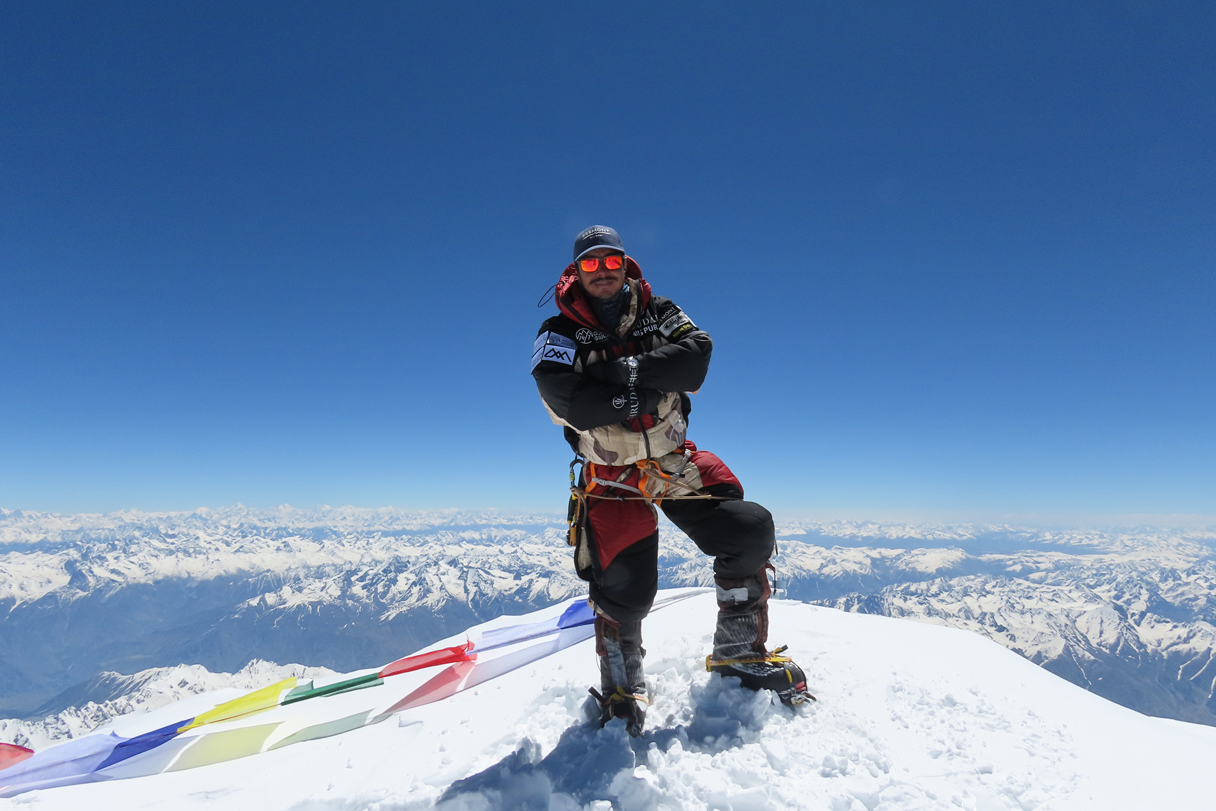 Nirmal Purja rests at the summit