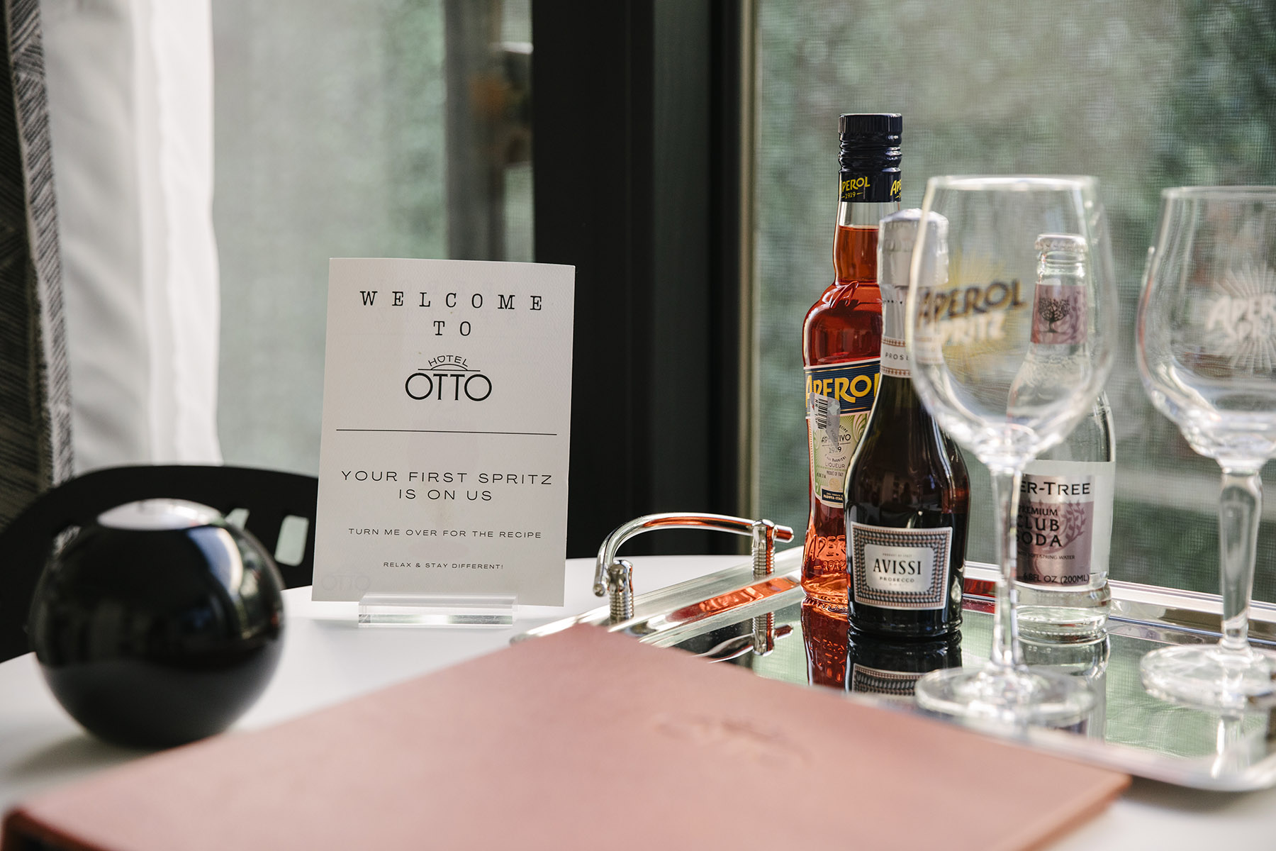 The fixings for an Aperol Spritz in a room at the Otto