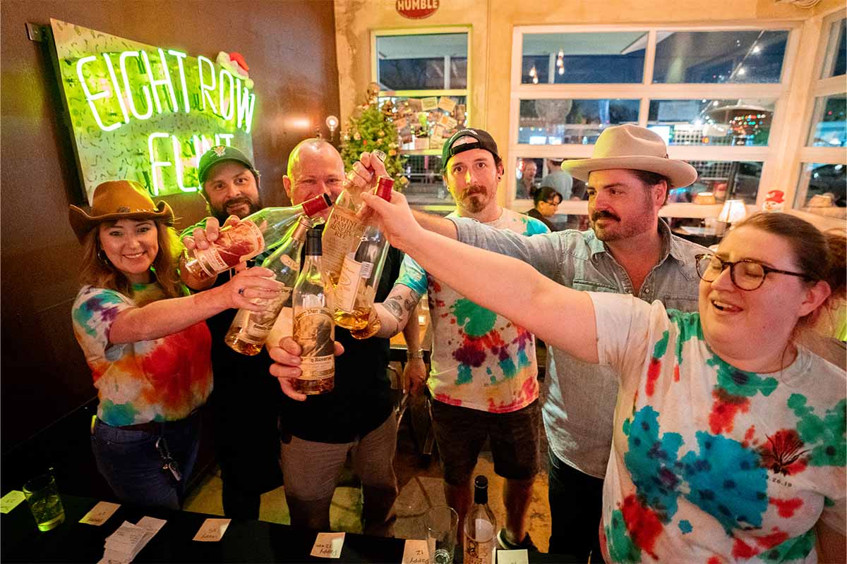 Eight Row Flint staff with bottles of Pappy