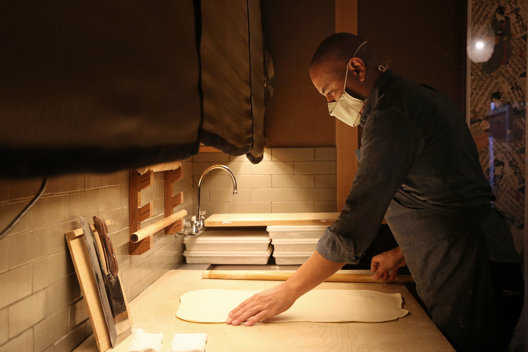 Sylvan Mishima Brackett rolls out dough to make udon at Rintaro in 2020