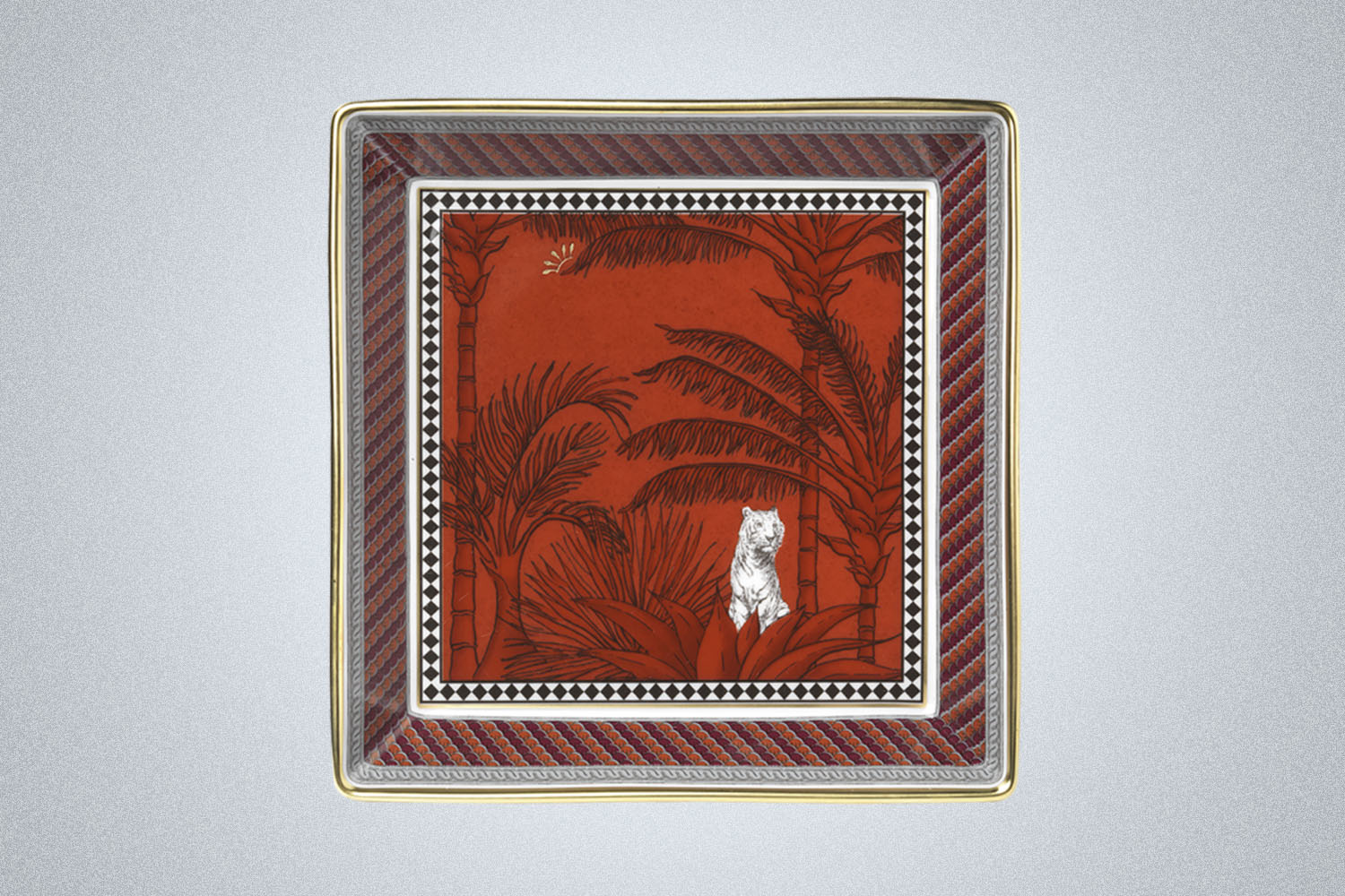 a red try with white trim and tiger graphic