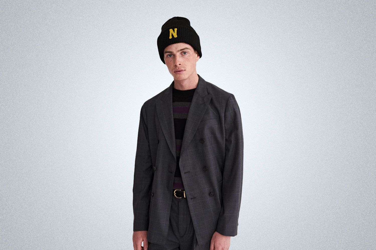 a grey, double breasted blazer on a model