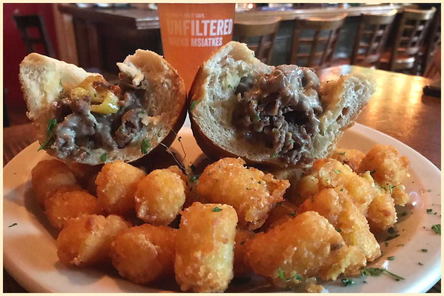 Pappas rates his cheesesteaks on roll, meat, cheese, extras, and overall experience
