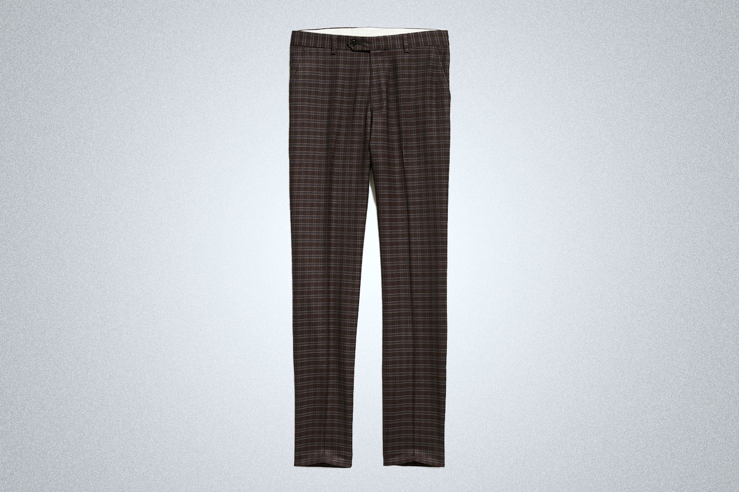 a pair of brown checked dress pants