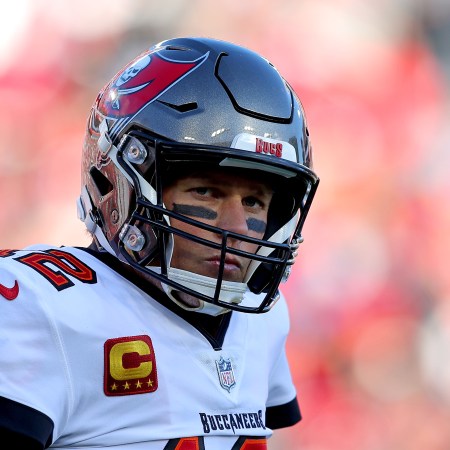 Tom Brady reacts in the second quarter of the game against the Los Angeles Rams in the NFC Divisional Playoff game at Raymond James Stadium on January 23, 2022 in Tampa, Florida.