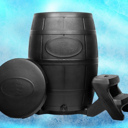 A barrel for cold plunges against a blue background.
