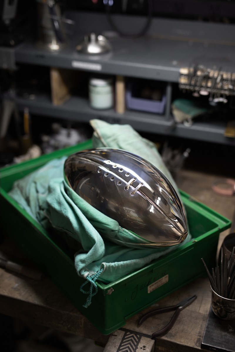 Tiffany & Co. created its first football trophy in 1959, the MacArthur Bowl, honoring General Douglas MacArthur. Still presented today, the trophy is awarded to the year's best college football team.