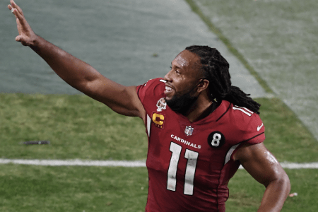 Wide receiver Larry waves to fans at State Farm Stadium in 2020