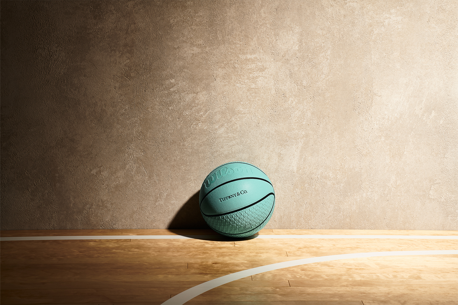 a blue basketball on a hardwood court