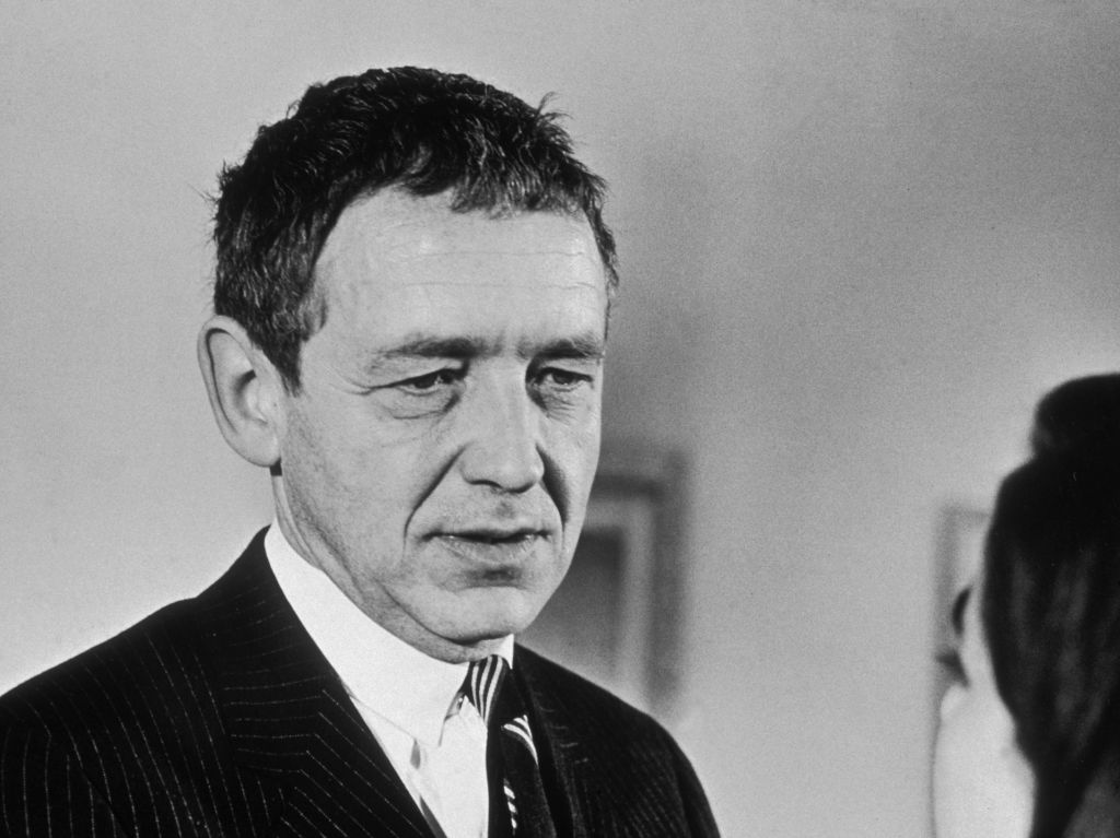 Painter Andrew Wyeth in a black and white photograph