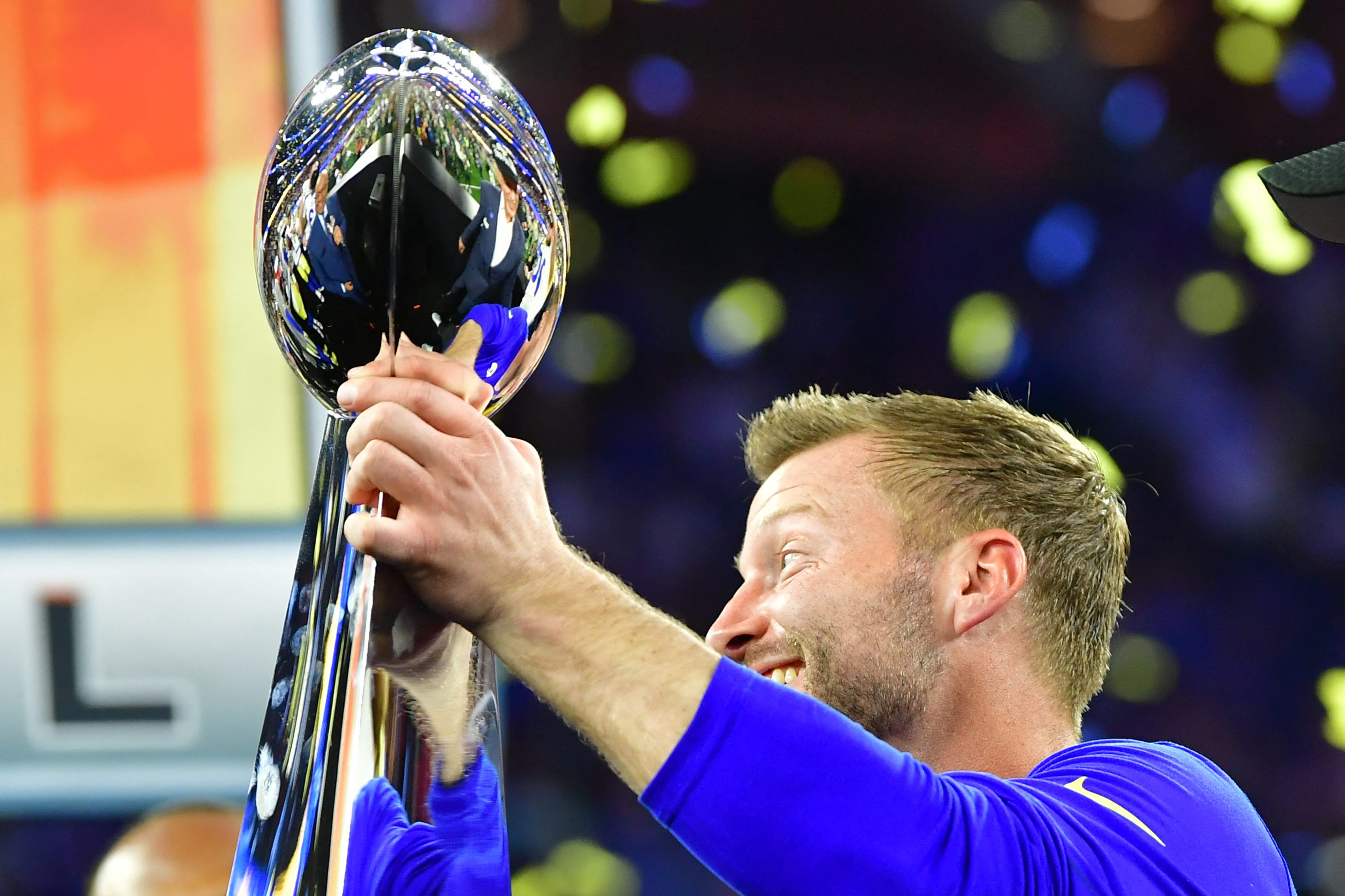 LA head coach Sean McVay holds up the Lombardi Trophy after winning Super Bowl LVI