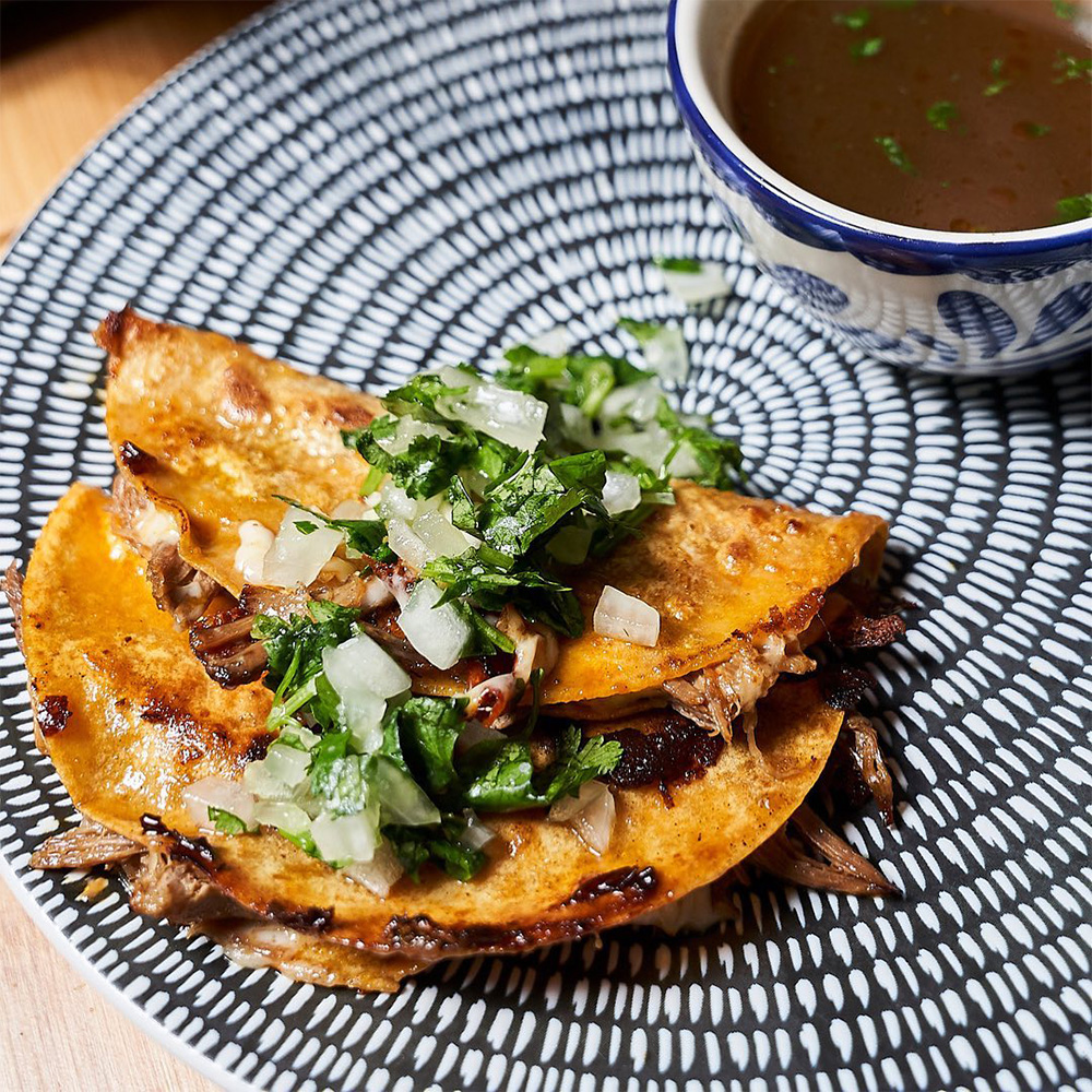 Birria tacos from Paloma Suerte.