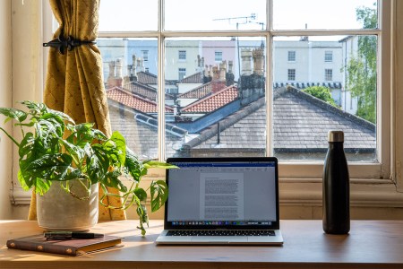 A desk facing a window.