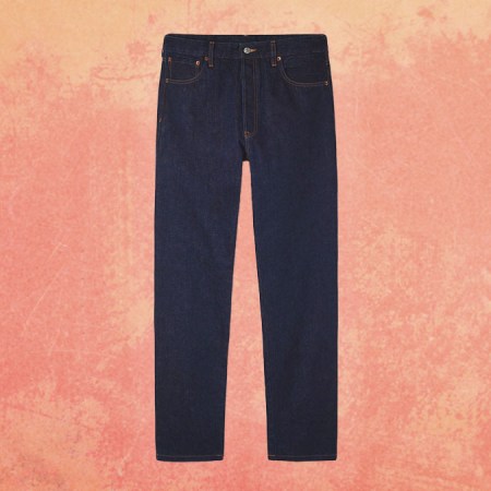 A pair of jeans on a orange background