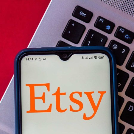 In this photo illustration the Etsy logo seen displayed on a smartphone. Here's why Etsy sellers are going on strike in April 2022.