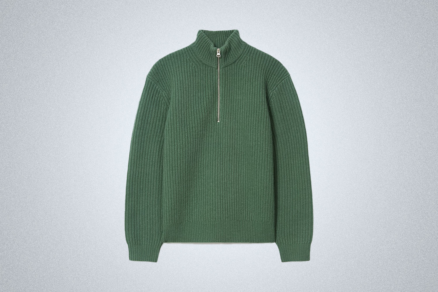 An Everlane Sweater on a grey background