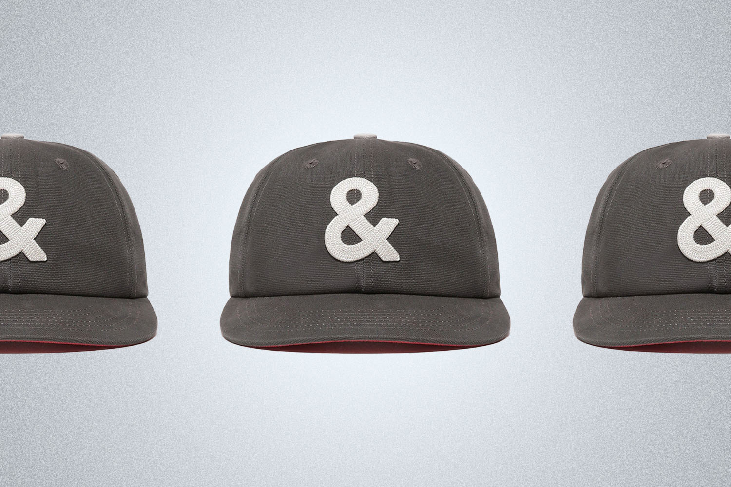 a Hat with an ampersand on a grey background
