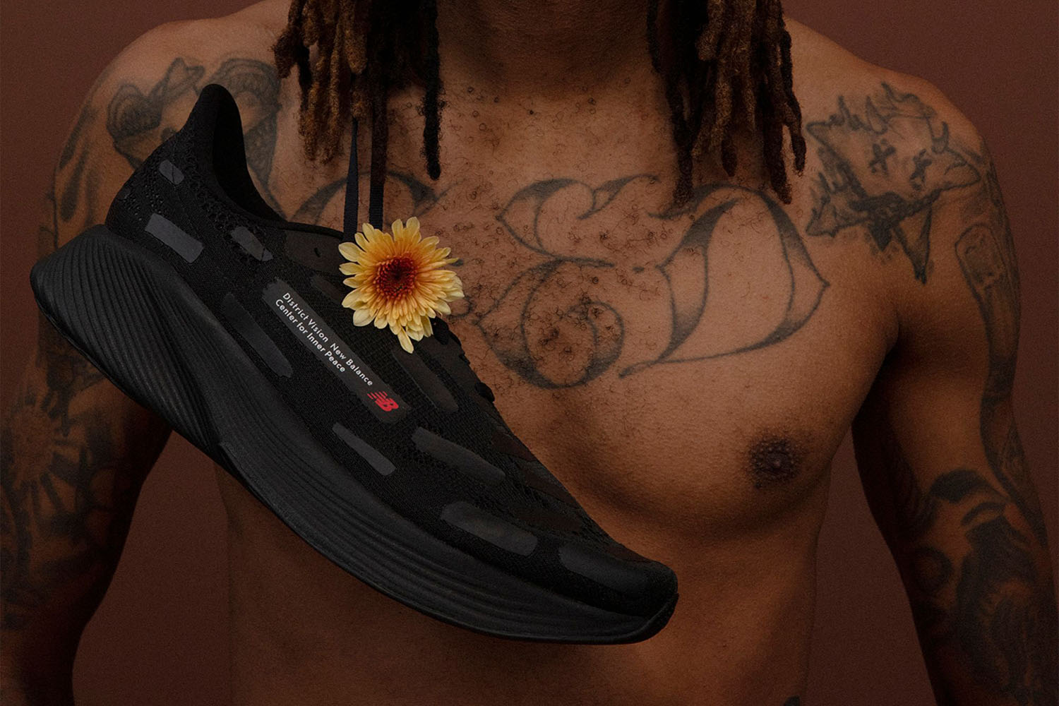 A model and a DV x NB shoe