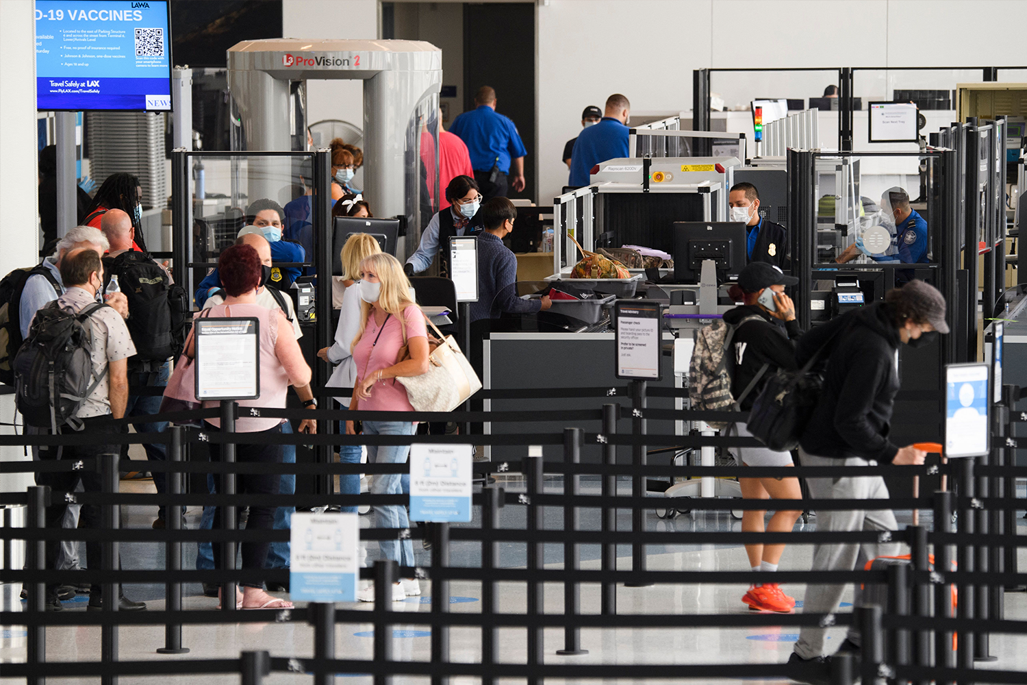 People in line at TSA