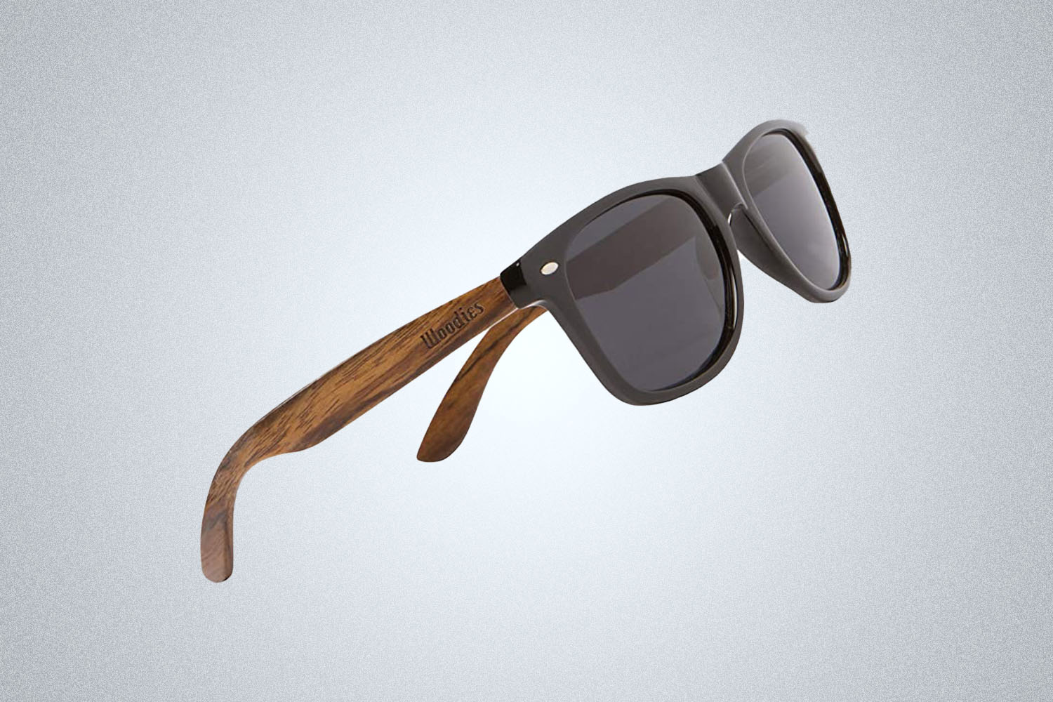 a pair of sunglasses on a grey background
