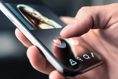 Online dating app in mobile phone. Like or swipe to match. Single man looking for love and relationship with smartphone. Woman with beautiful profile picture on internet site
