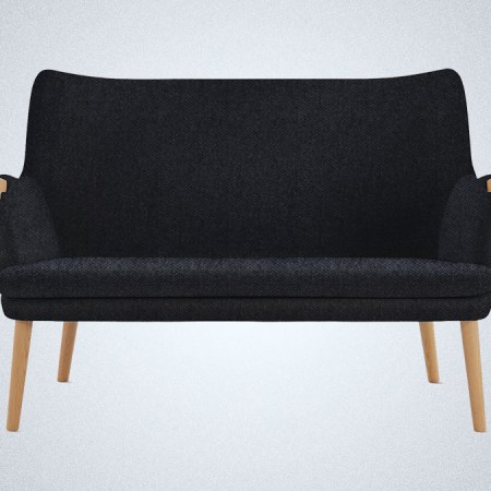 Two lounge chairs and a sofa from Design Within Reach, which has just opened its Semiannual Sale offering furniture discounts in March 2022