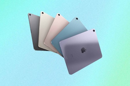 a person at a desk using the new Mac Studio and Studio Display, all of which are on sale during preorders