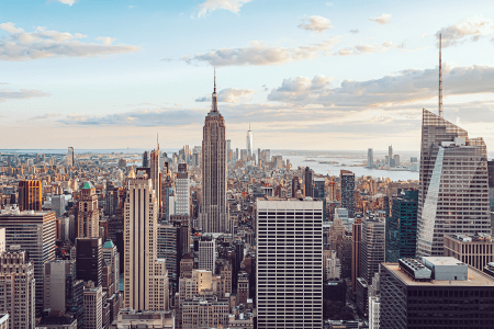 A photo of the New York City skyline. A new NYC grifter has appeared: Konrad Bicher, who calls himself the "Wolf of Airbnb."