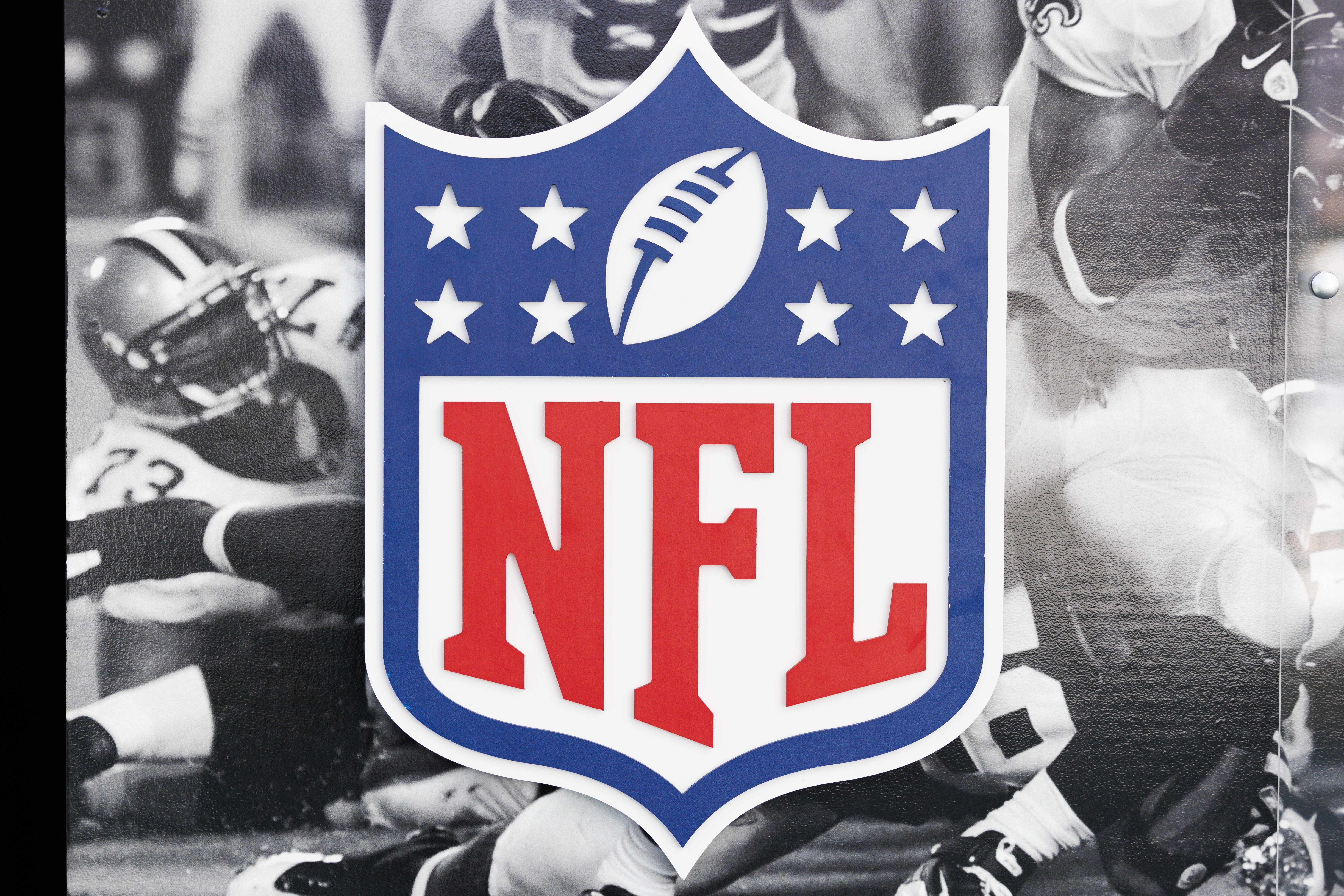 A detailed view of the NFL shield logo at the Super Bowl Experience