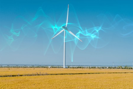 A wind turbine emitting invisible energy waves.