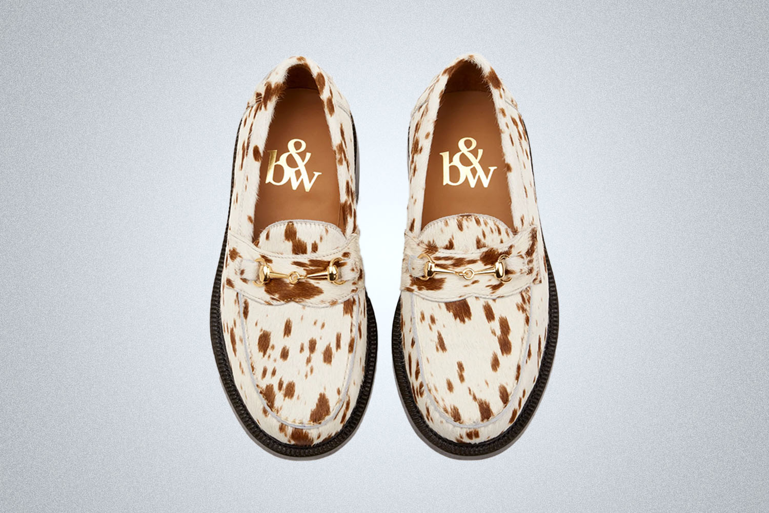 a white palomino colored loafer