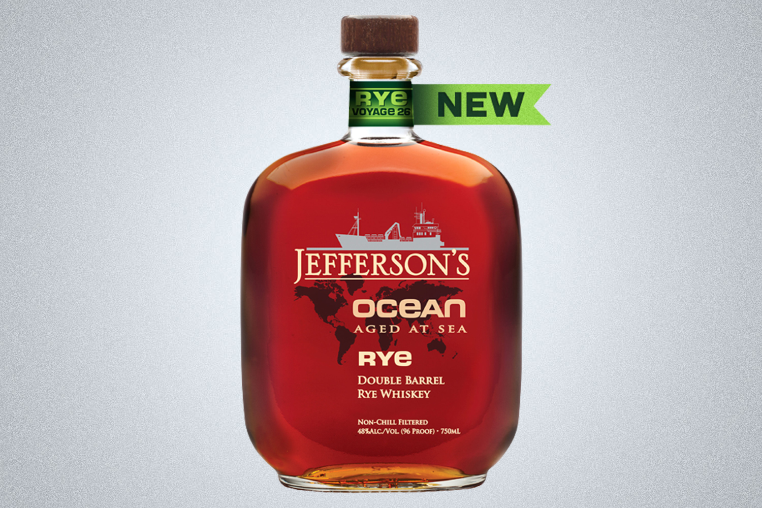 an amber whiskey on a grey background