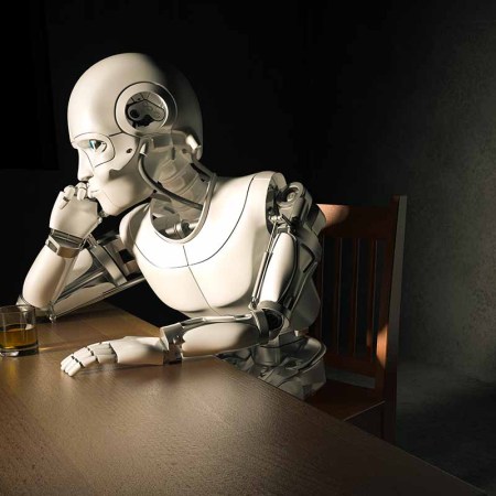an android alone at a bar drinking whiskey. A new robot "e-nose" has been created that can help identify different whisky brands.
