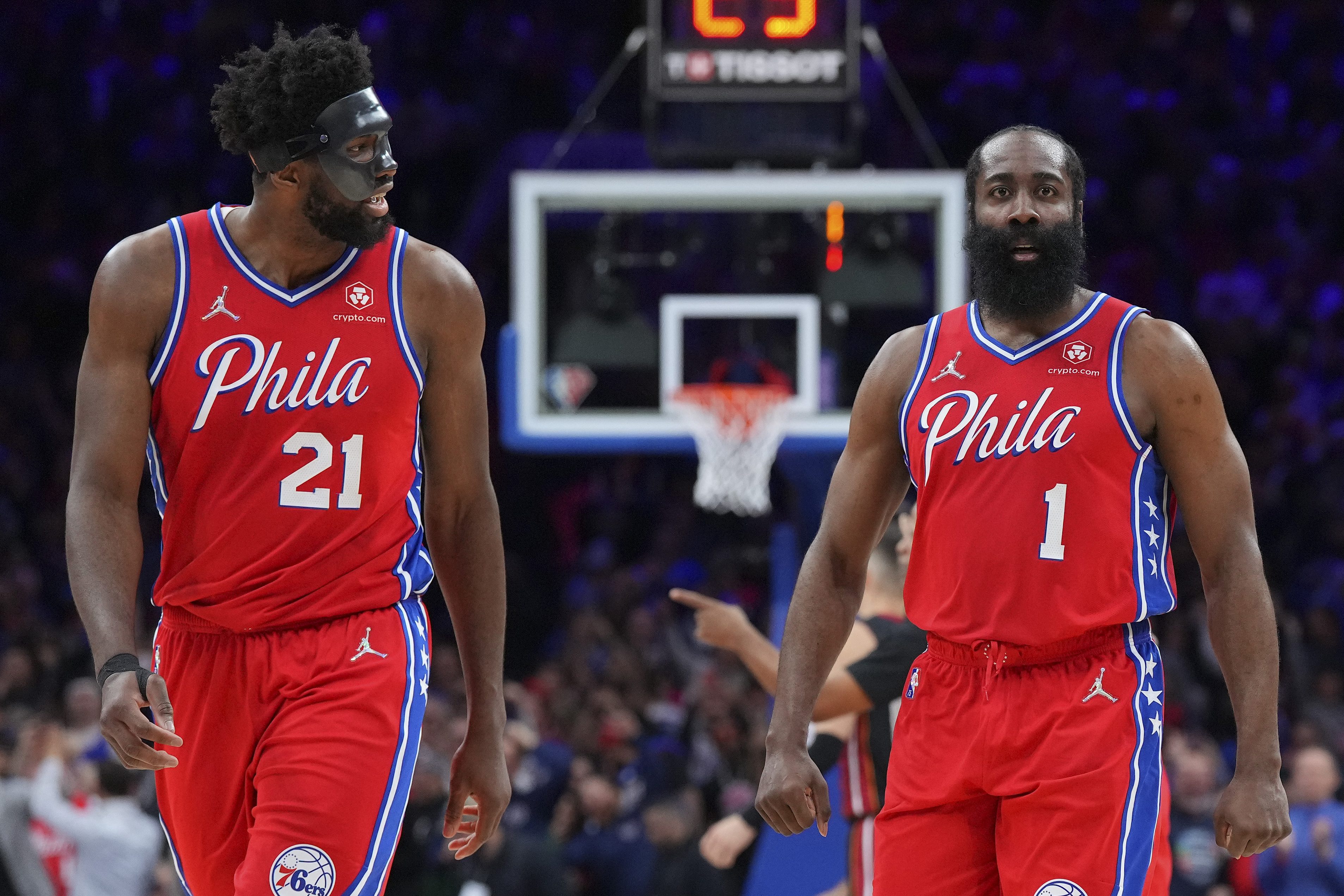 James Harden and Joel Embiid react against the Miami Heat during Game Four of the playoffs
