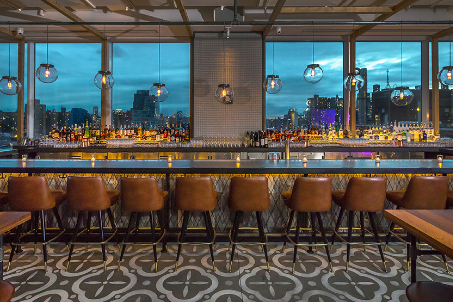 The bar at Mr. Purple, the rooftop bar at the Hotel Indigo LES