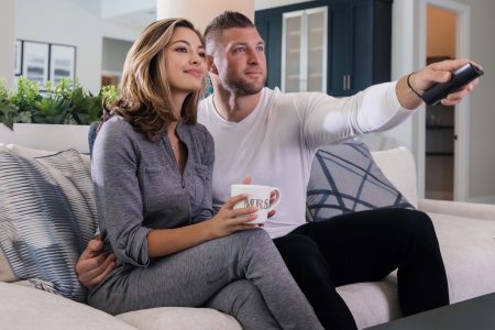 Why Watching Sports Is Part of Tim Tebow’s Wellness Regimen