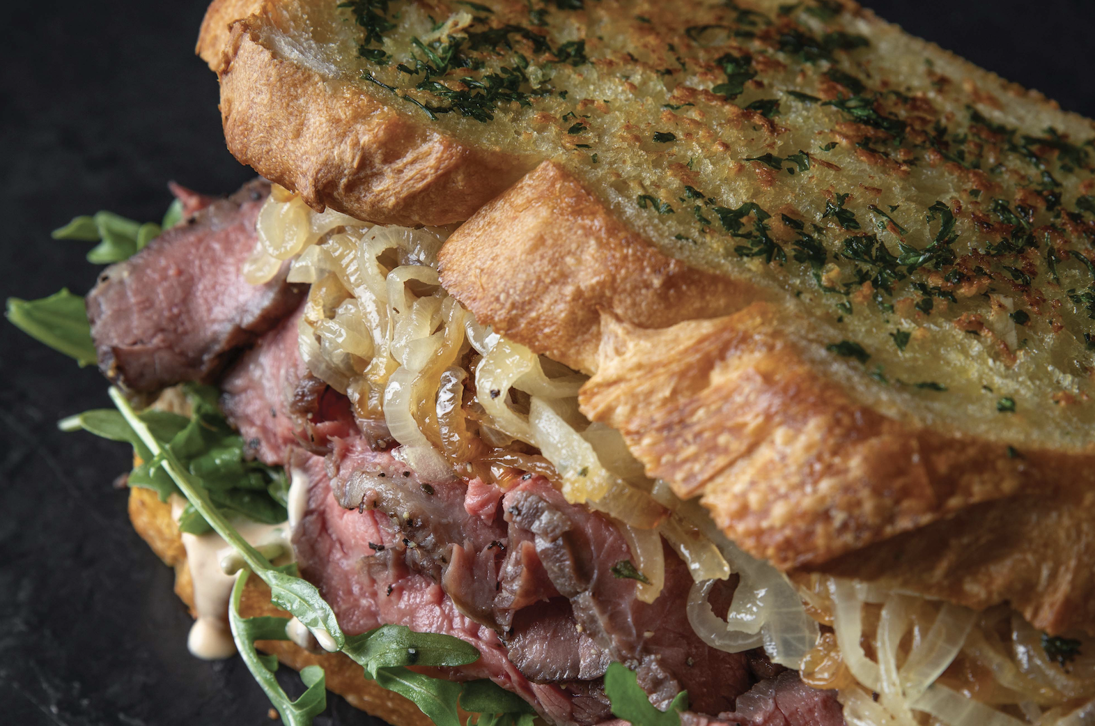 A garlic bread steak sandwich a day keeps the vampires away.