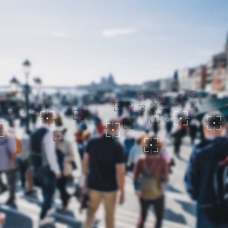 Face recognition signs and tags on people faces. Privacy and personal data protection. Blurred picture with drawn symbols.