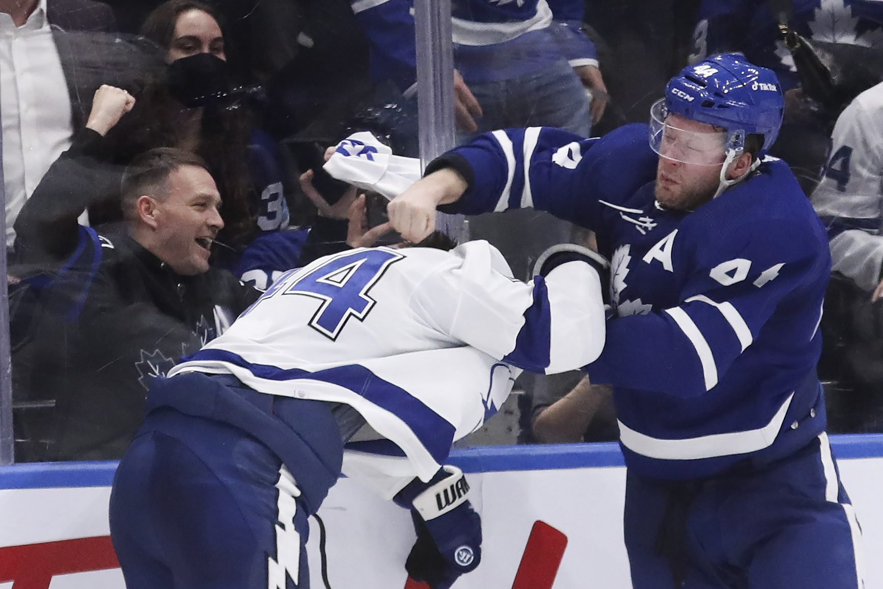 Morgan Rielly of the Toronto Maple Leafs and Jan Rutta of the Tampa Bay Lightning battle it out