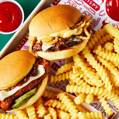 A plate of a Shake Shack burger, chicken sandwich, fries and ketchup. The sandwiches feature a new Maker's Mark bourbon bacon jam, and we got the recipe if you want to make it at home.