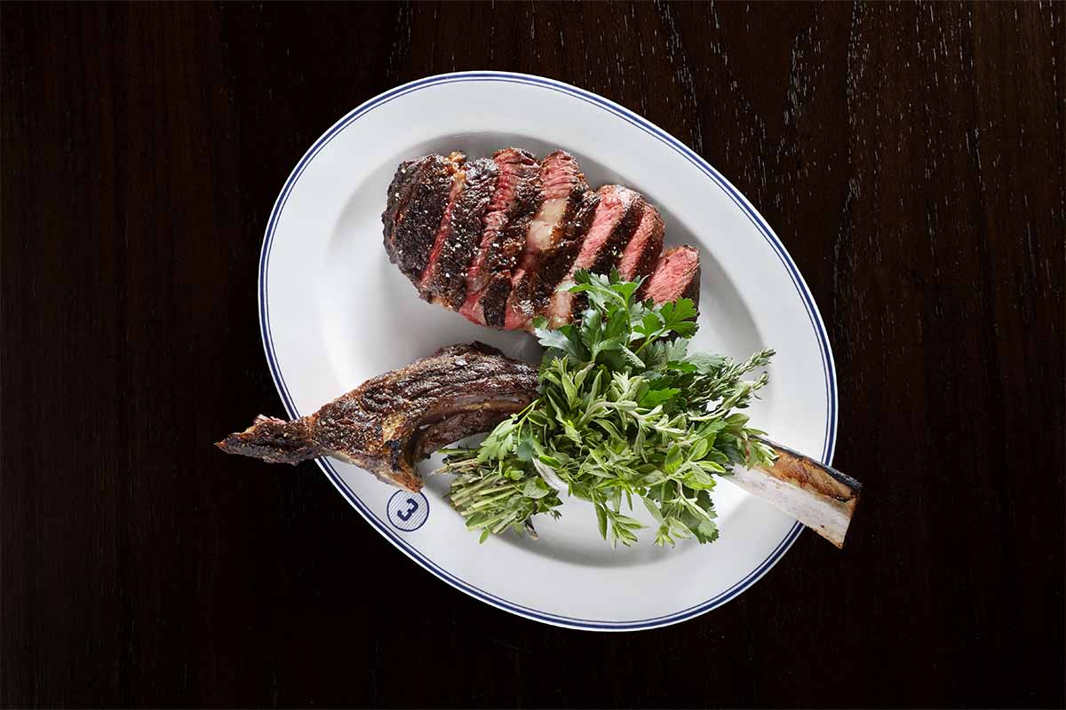 A steak on a plate at NYY, the steakhouse at the new Hard Rock Hotel