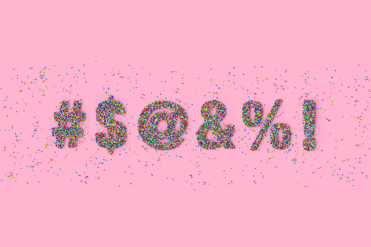 Expletive punctuation against a pink background.