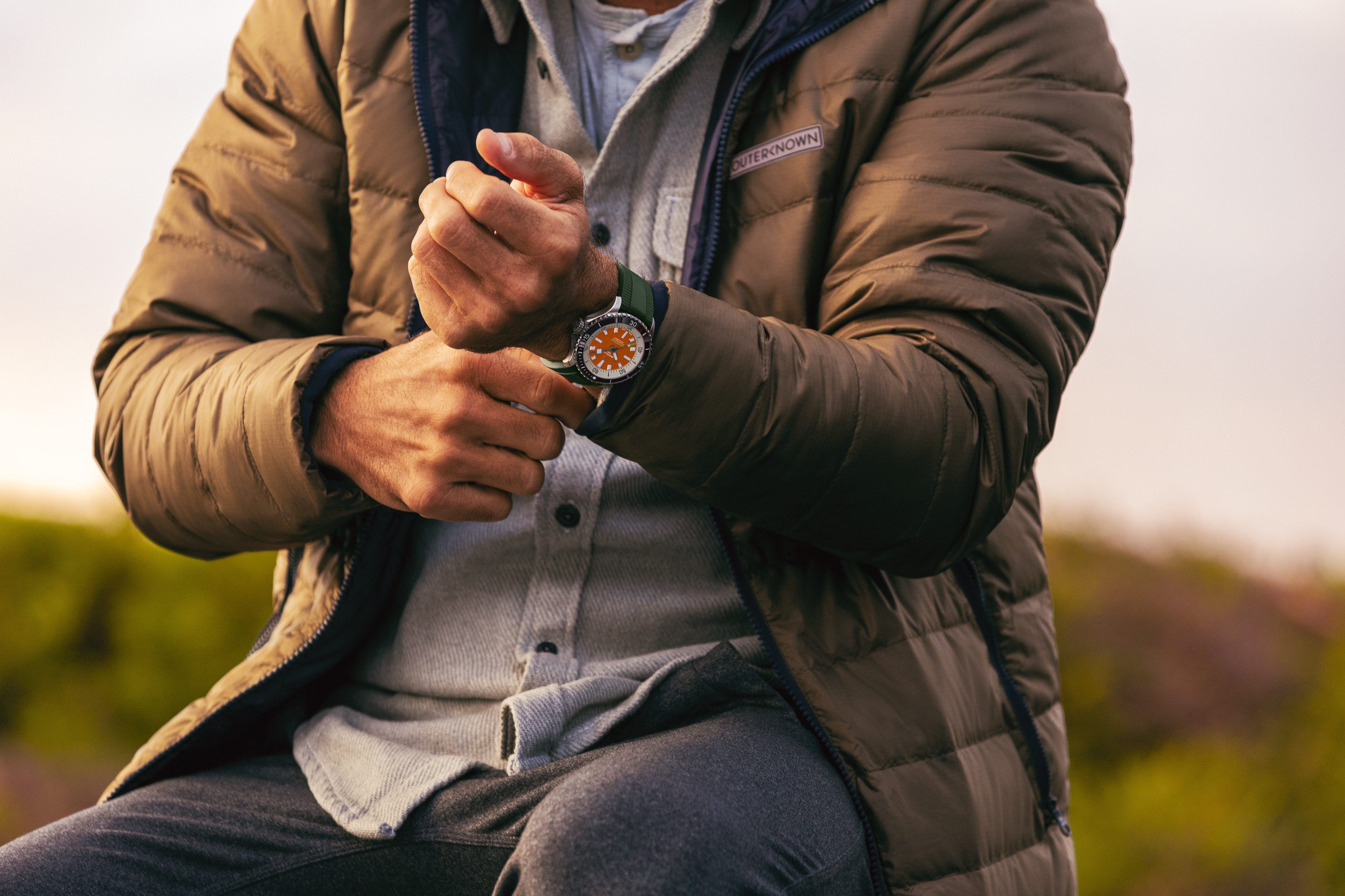 Kelly Slater with his signature Breitling watch