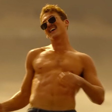 a picture of Miles Teller in Top Gun:Maverick shirtless, dancing and wearing the Ray-Ban Caravan sunglasses