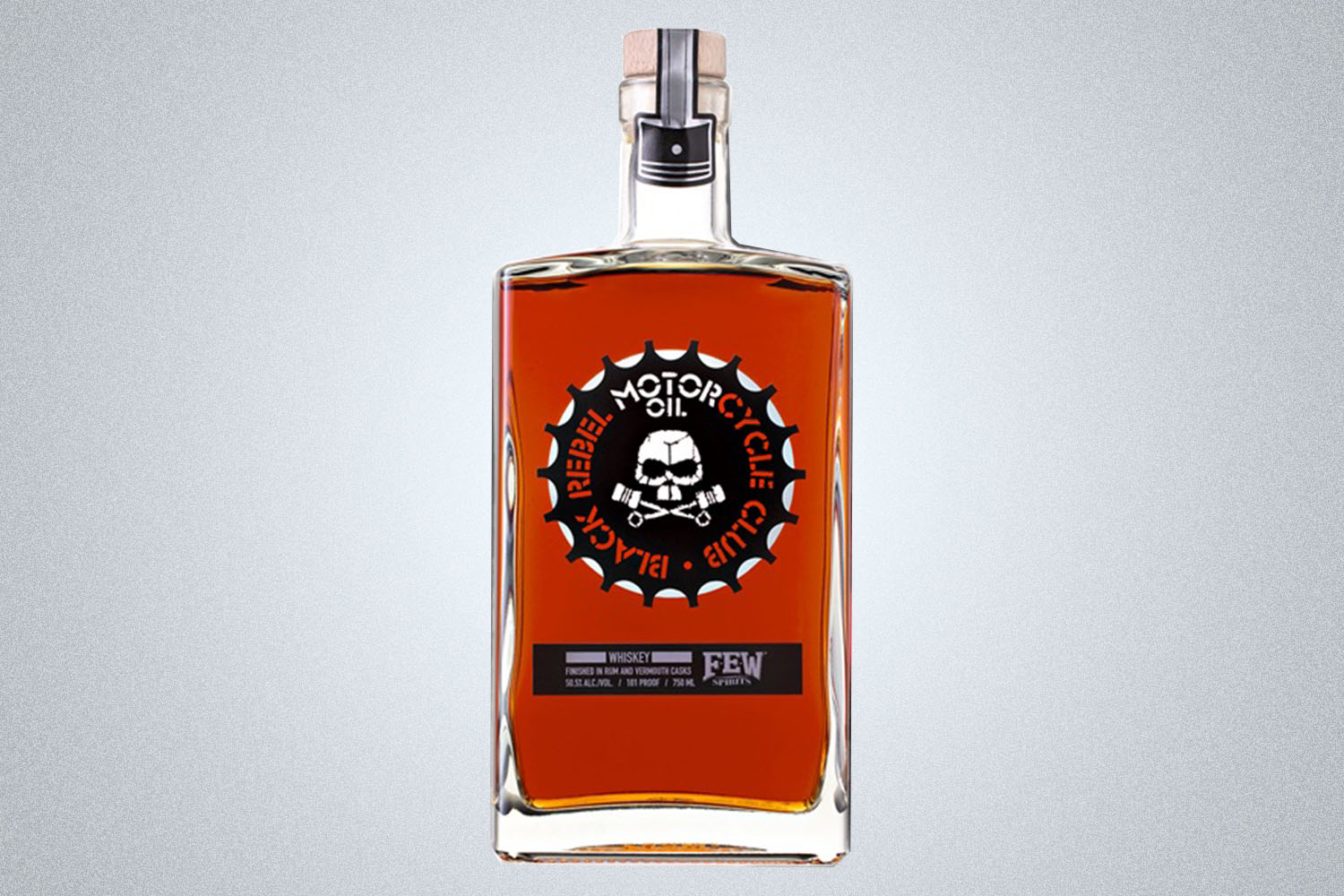 a bottle of whiskey on a grey background